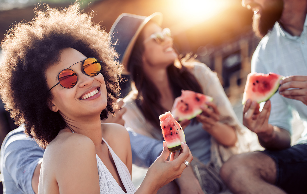 Women eating watermelon
