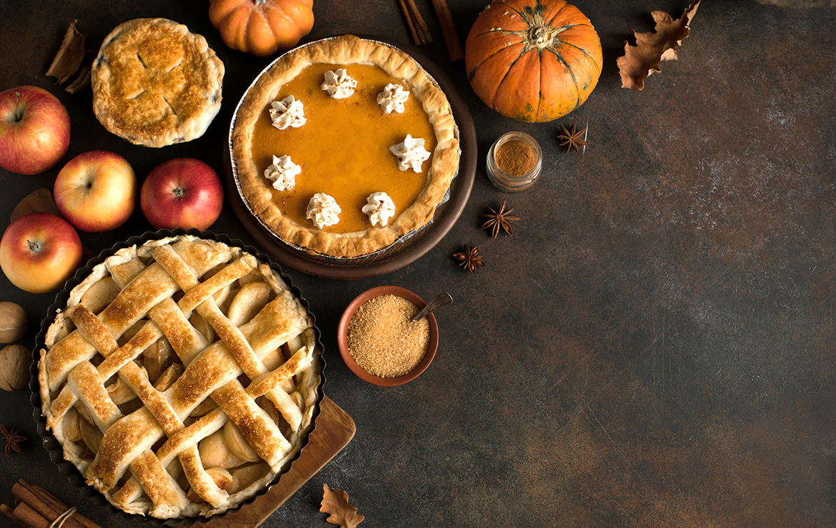 Assortment of pies, applies and pumpkins