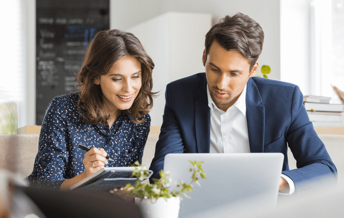 Businesspeople sitting together in meeting