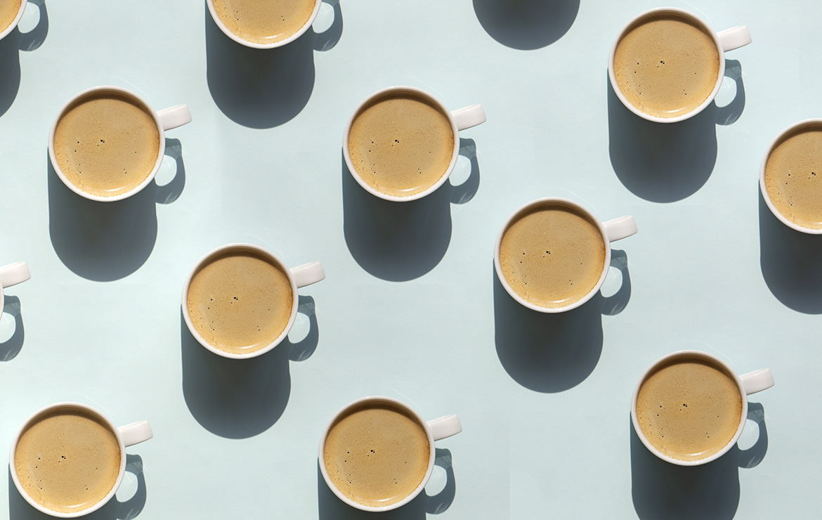 Cups of coffee on top of table