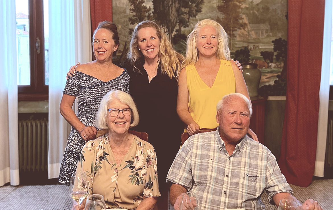 family photo of Dede and Michael Alpert with family members