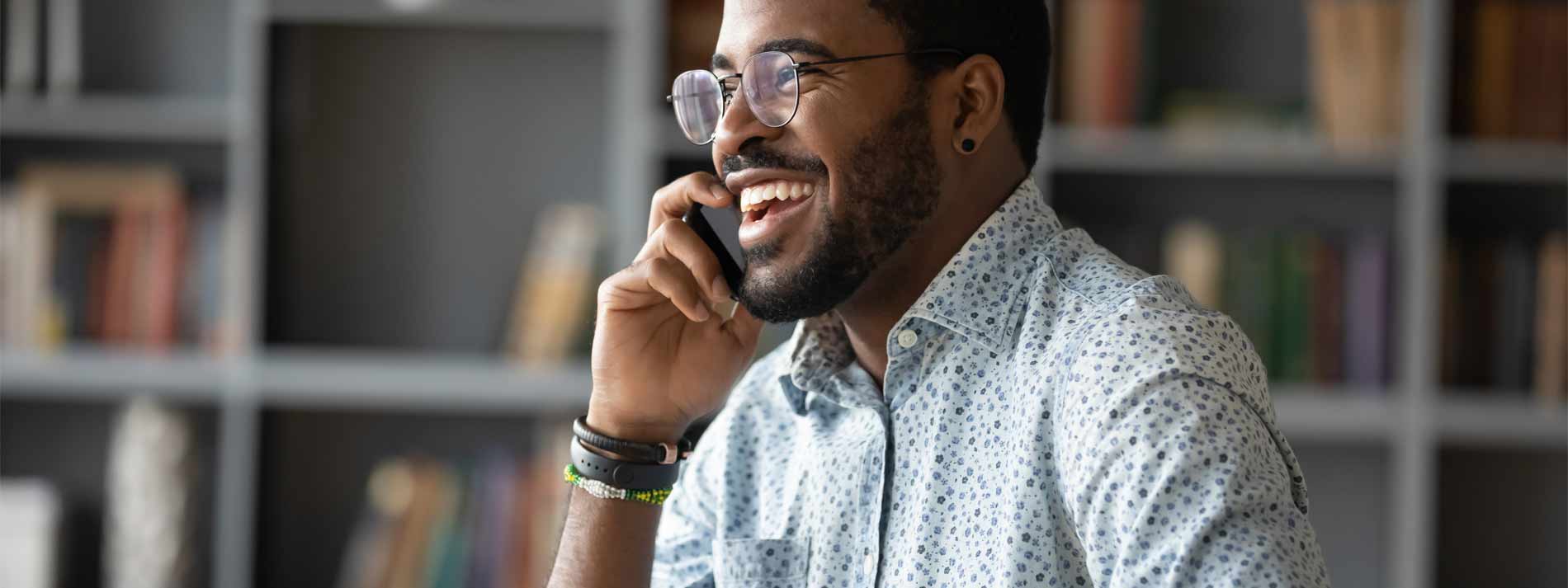 Smiling man on the phone