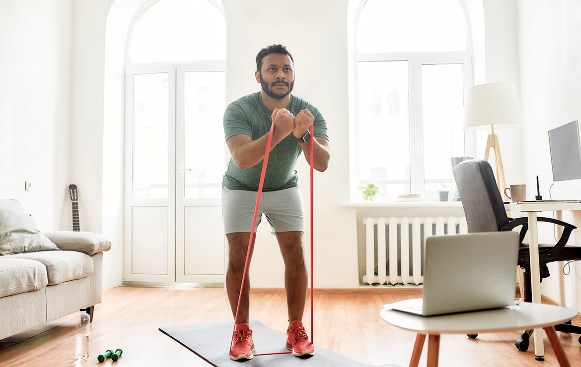 Man working out from home