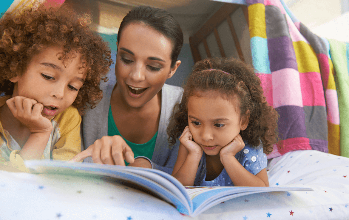 Mother and children reading together
