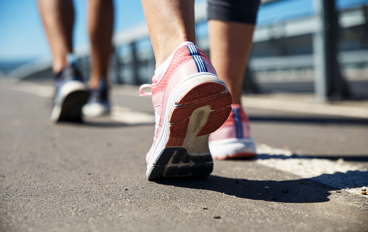 People jogging showing their running shoes