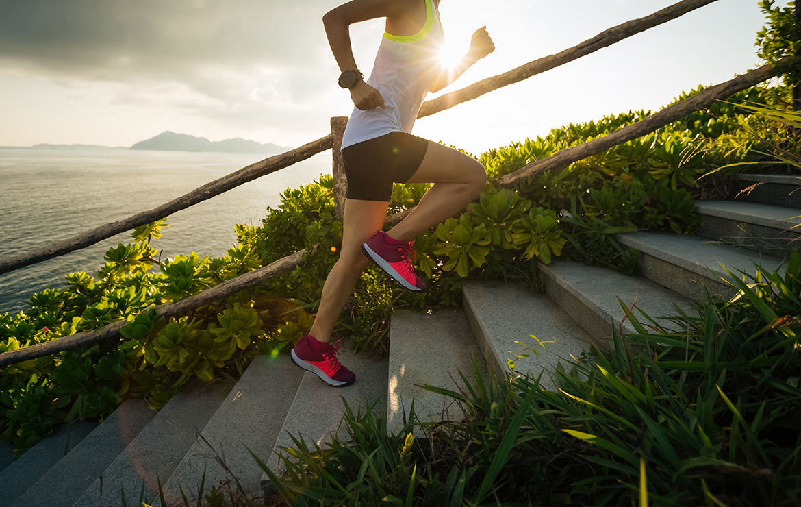 Person jogging up the stairs in wilderness