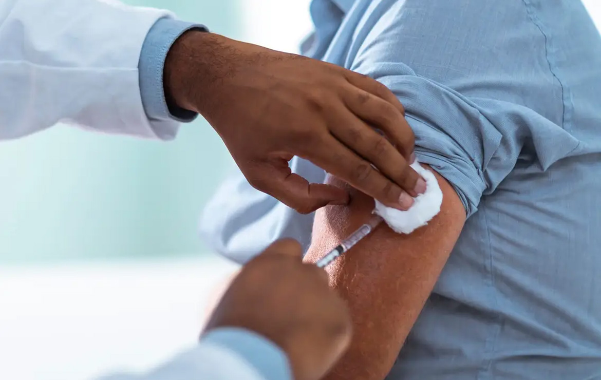 Vaccine being administered in arm