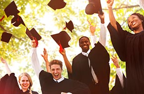 Health insurance for post graduates Students throwing caps in the air